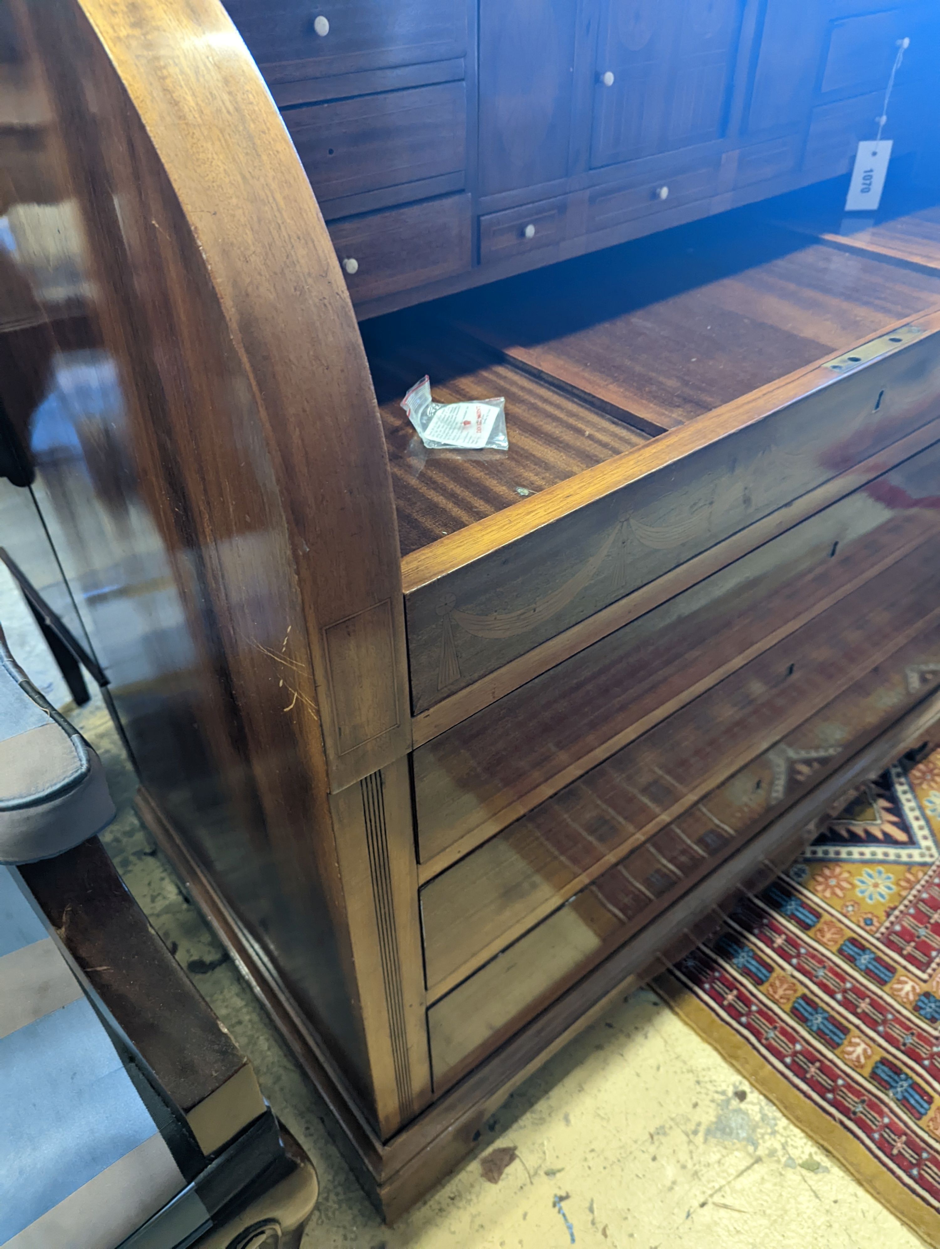 A reproduction inlaid mahogany cylinder bureau, width 110cm, depth 58cm, height 115cm